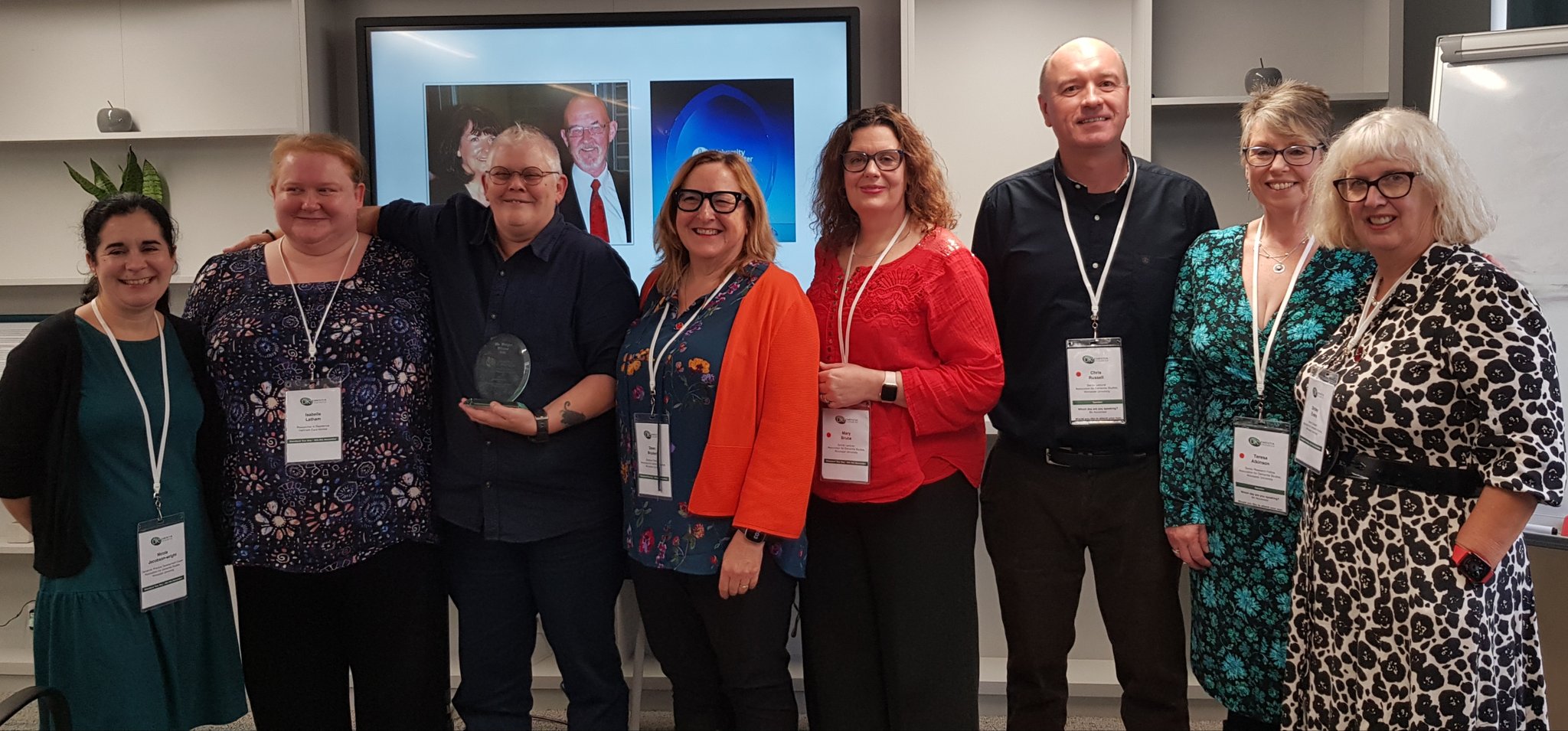 Stuart Wright receiving his award with Professor Dawn Brooker and tutors from the PG Cert course.